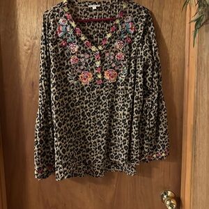 This boutique brand Oddy is a boho top size M